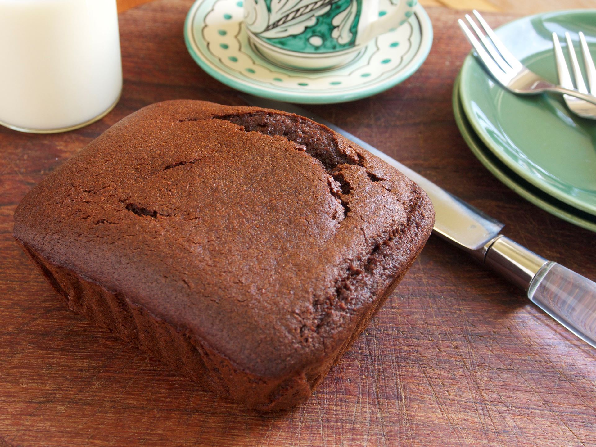 Picture of Chocolate Olive Oil Cake -- 10 oz by weight in a small tin (5 in x 4 in)